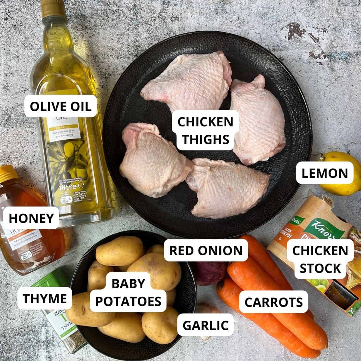 ingredients for a lemon and garlic chicken tray bake