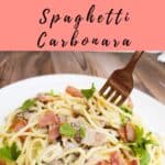 spaghetti carbonara being twizzled with a fork.