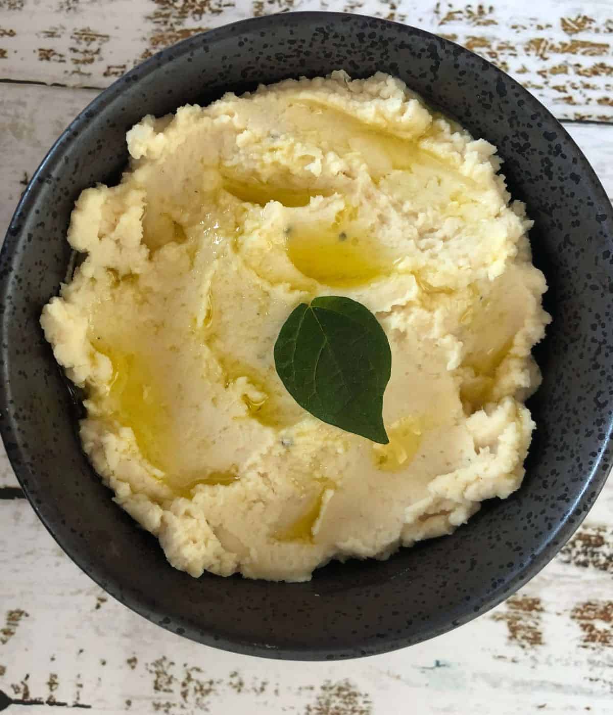 butterbean dip in a black bowl