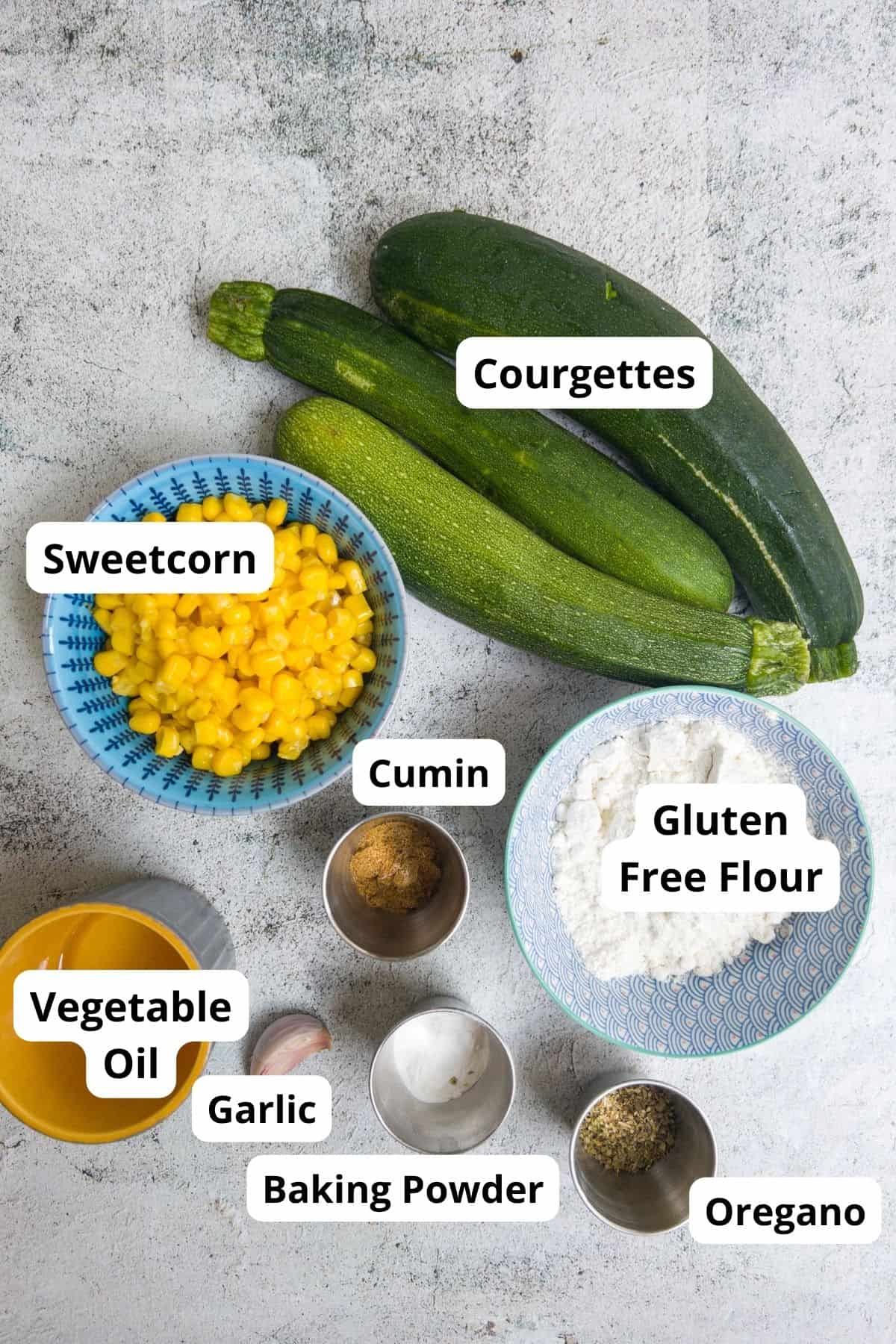 ingredients laid out to make courgette & sweetcorn fritters