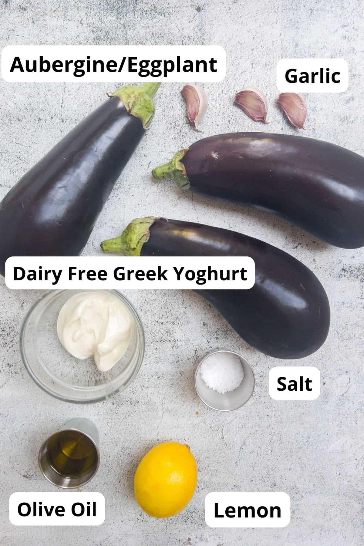 ingredient laid out for baba ganoush including aubergine and lemon