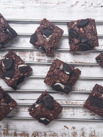 chocolate brownies on a silver cooling rack.