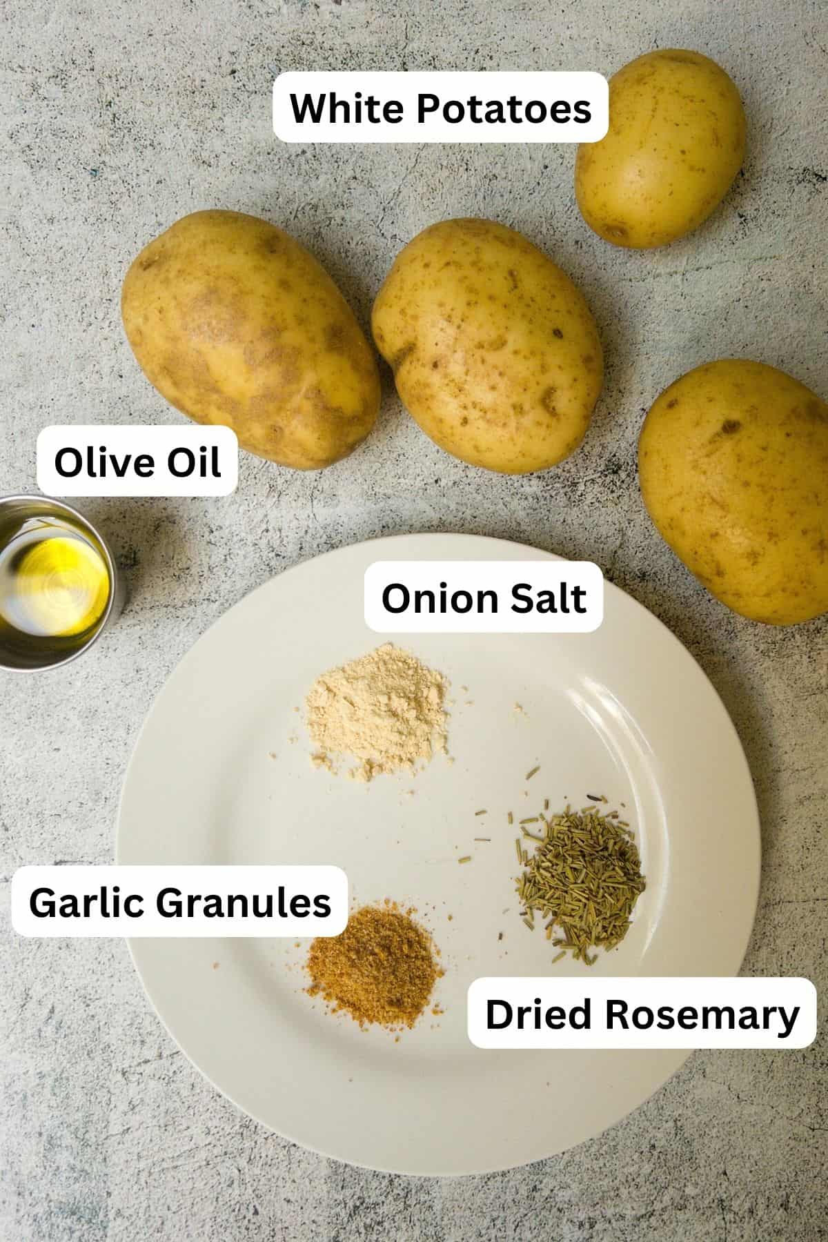 ingredients laid out to make slow cooker roast potatoes.