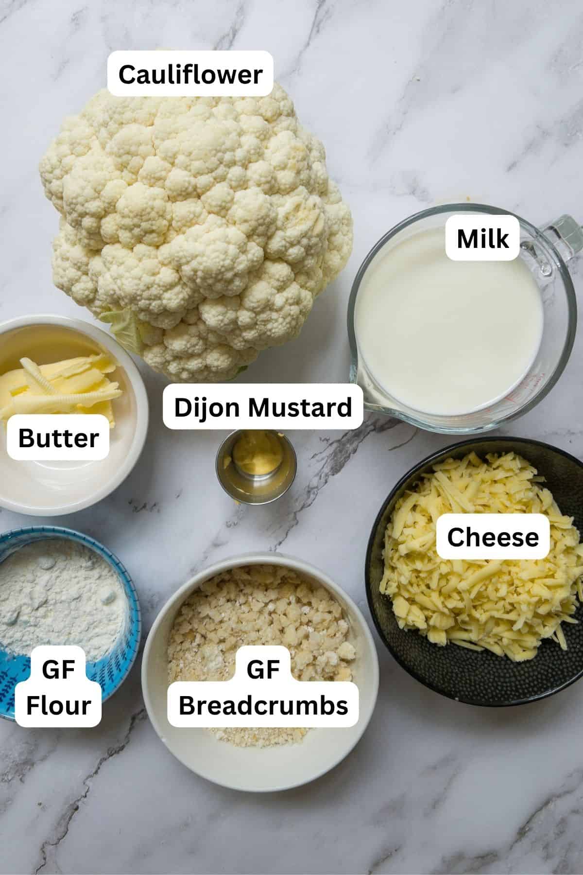 Ingredients laid out for a gluten free cauliflower cheese.