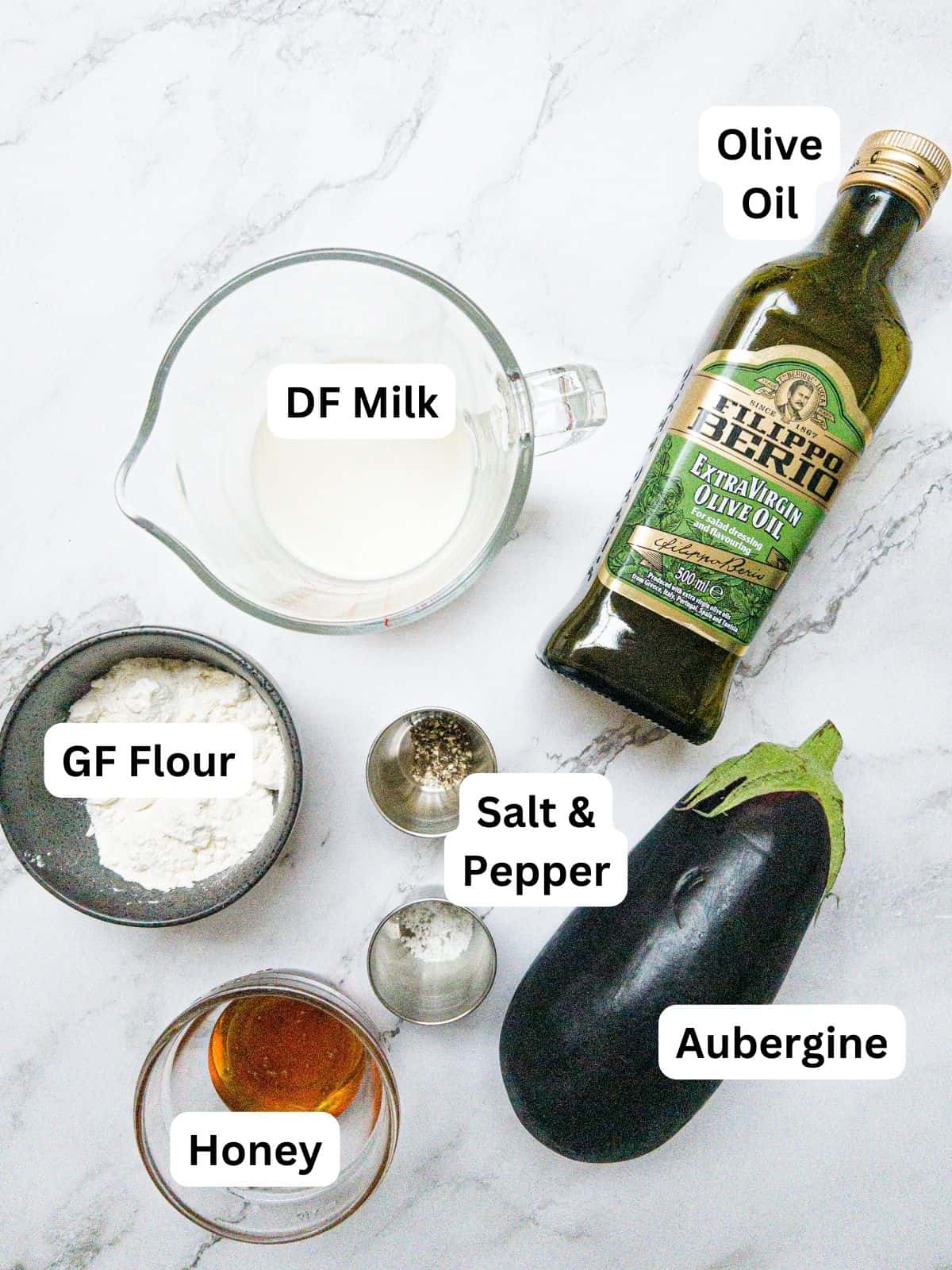 Ingredients laid out for fried aubergine with honey.