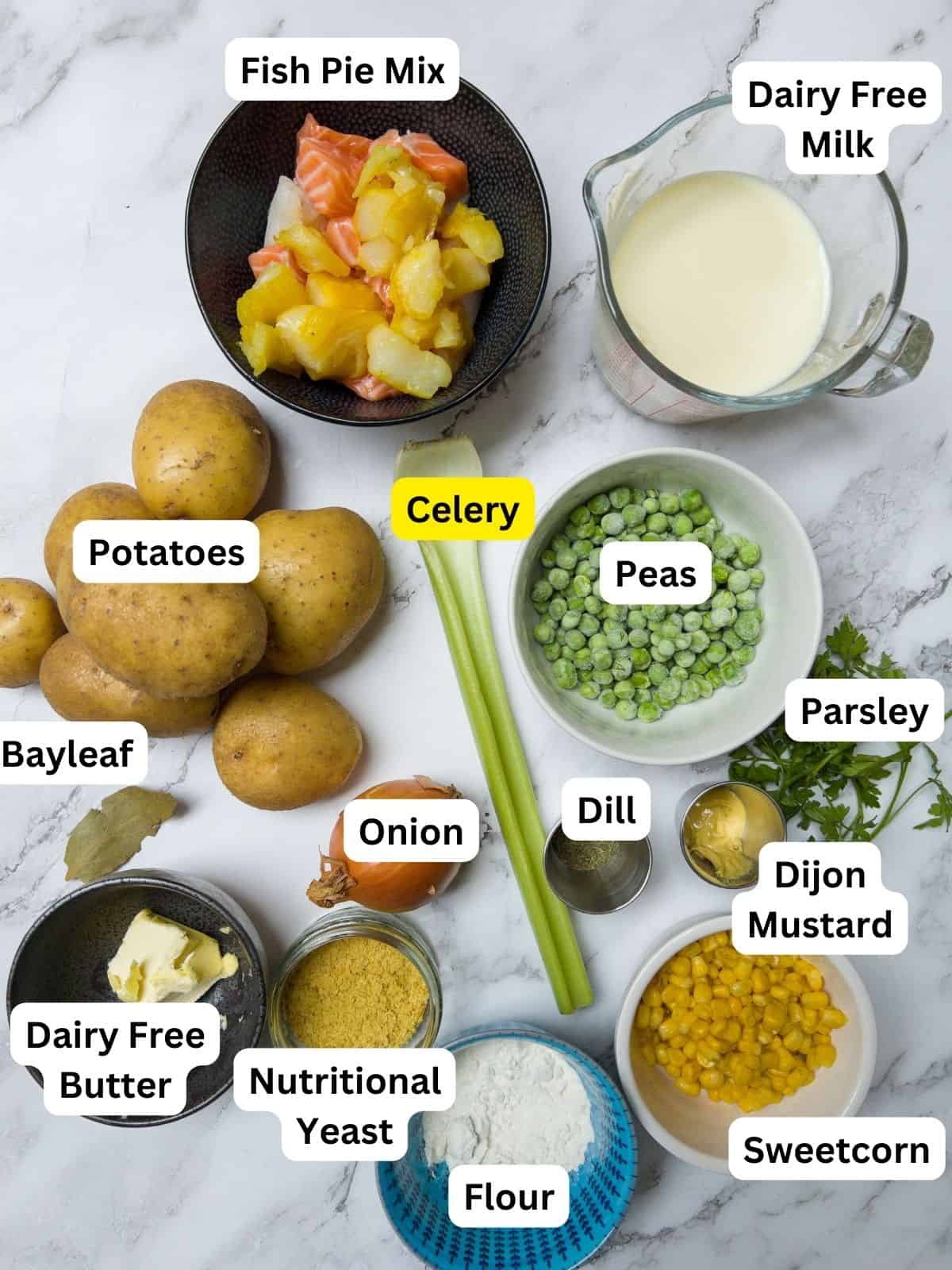 Ingredients laid out for dairy free fish pie.