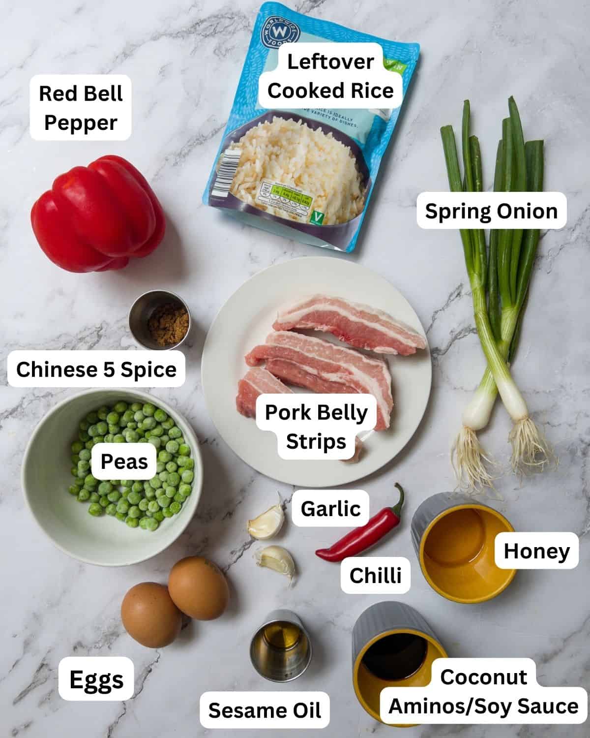 Ingredients laid out for pork belly fried rice.