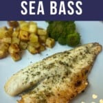 A seasoned fillet of seabass on a white plate with broccoli and cubed potatoes.