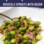 Fried Brussels sprouts and bacon in a white bowl.