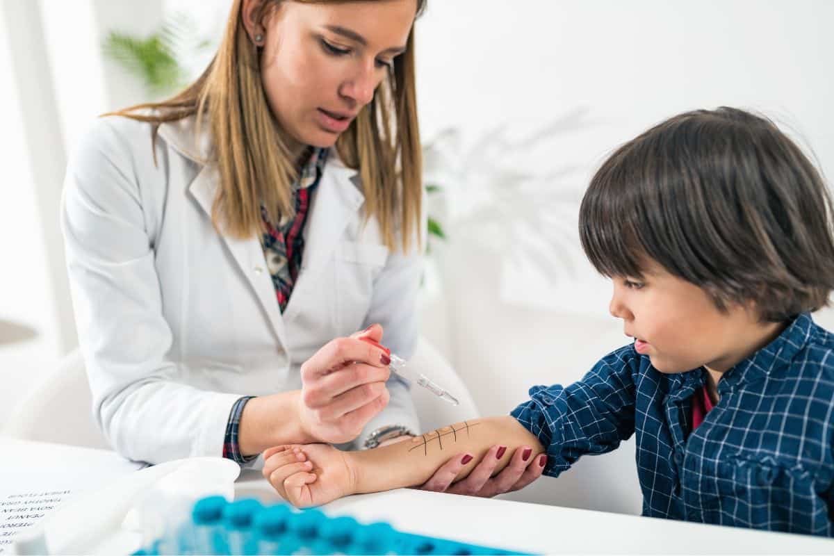 A child having skin prick testing carried out for allergies.