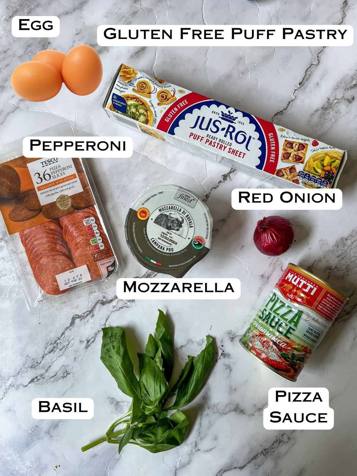 Ingredients laid out for gluten free puff pastry pizza.