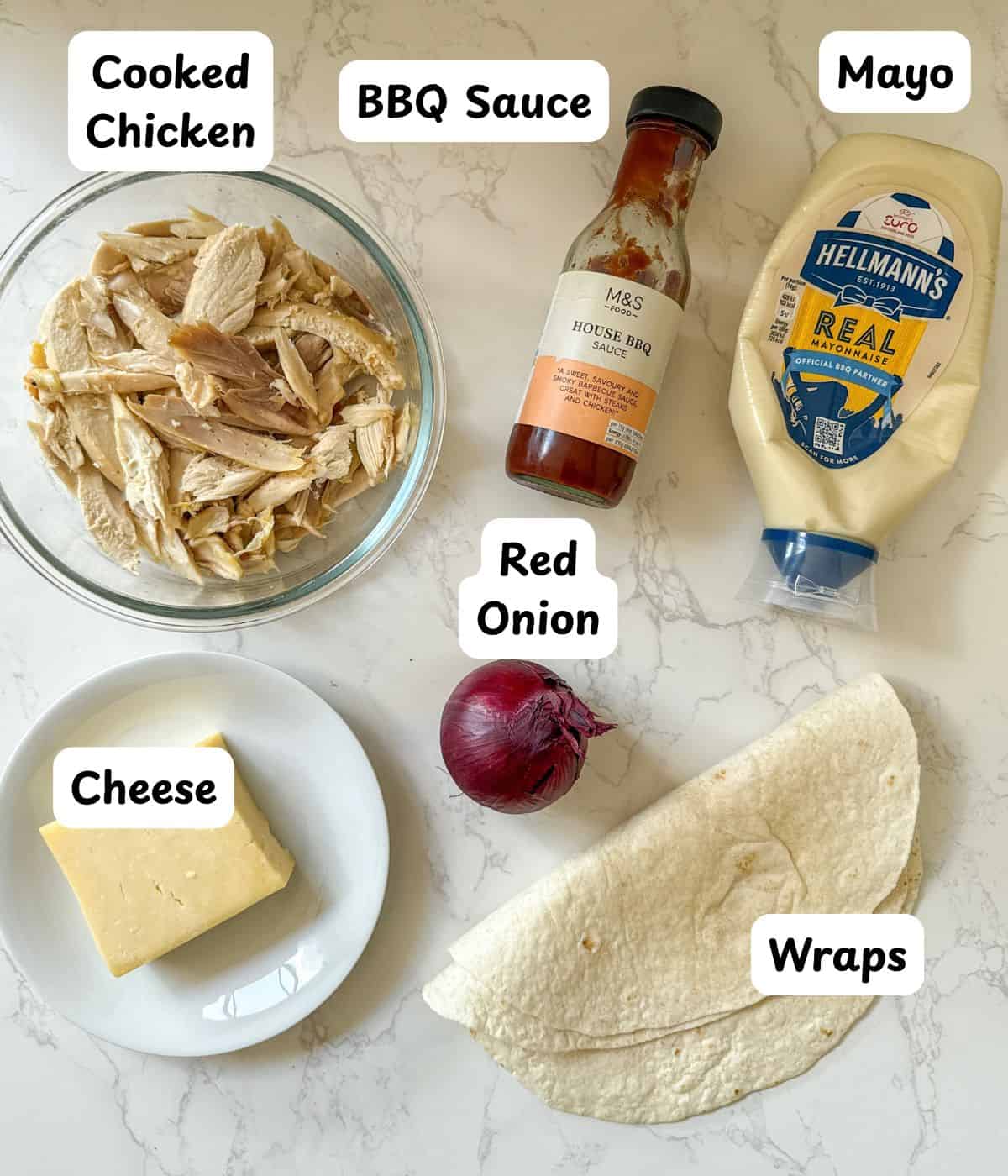 Ingredients laid out to make a bbq chicken and cheese wrap.