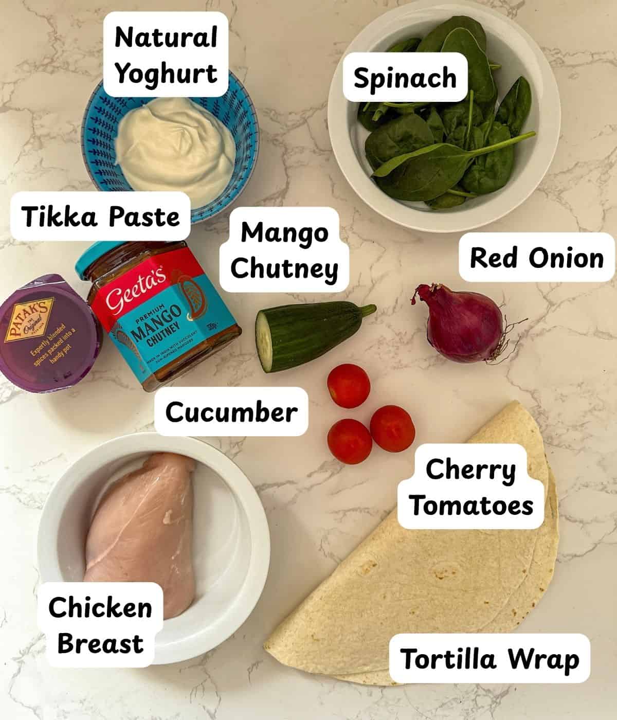 Ingredients laid out for chicken tikka wrap.