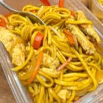 Chicken chow mein in a takeaway container.