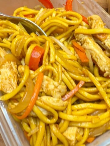 Chicken chow mein in a takeaway container.