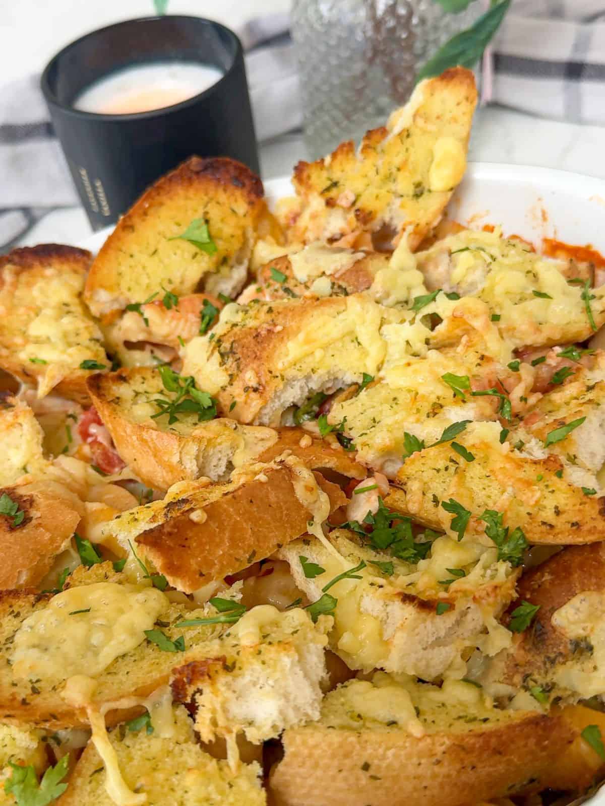 Garlic bread topped pasta bake.